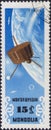 Saint Petersburg, Russia - January 03, 2020: Postage stamp issued in Mongolia with the image of the Weather satellite Tiros, circa