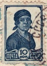 Saint Petersburg, Russia - January 25, 2020: Postage stamp issued in the Soviet Union with the image of the Female worker, circa