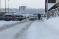 Saint Petersburg, Russia January 2019: snow roads city cars in city street in winter Royalty Free Stock Photo