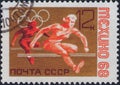 Saint Petersburg, Russia - January 16, 2020: Postage stamp issued in the Soviet Union with the image of the Hurdle runner, circa