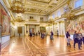 Tourists in the St. George Hall of State Hermitage Museum. Saint Petersburg. Russia