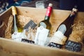 Bottles of wine in a vintage wooden box. Decoration showcase wine shop