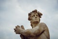 Fragment of the statue in Peterhof in St. Petersburg. Sights of Russian culture