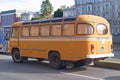 Saint Petersburg, Russia - July 30, 2017: Image of the yellow old Soviet bus PAZ-672 on the waterfront