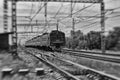 Stylized black-and-white landscape with a Russian Railways electric train