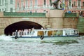 Tourists ride the boat through the canals in St. Petersburg Royalty Free Stock Photo