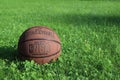 Saint Petersburg, Russia - JUNE 05 2019: basketball ball on green grass. concept of NBA playoff final. spalding basketball backgro