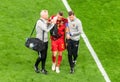 Belgium national team doctors escorting right-back Timothy Castagne out from the pitch during EURO 2020 match Belgium vs Russia 3