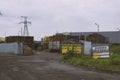 Industrial area and pallet warehouse with posters in Russian `buy pallets` Royalty Free Stock Photo