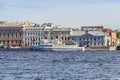 Neva River withpatrol boat and the Angliyskaya Embankment with former palatial houses in St. Petersburg, Russia