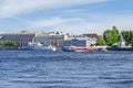 Neva River with a hydrofoil and the Angliyskaya Embankment with former palatial houses in St. Petersburg, Russia