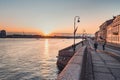 Sunrise over Neva river on Palace embankment. Early morning in Saint-Petersburg. Russia