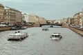 Saint Petersburg, Russia, 27 June 2019 - tourists ride on excursion boats on city water channels