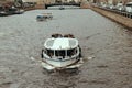 Saint Petersburg, Russia, 27 June 2019 - tourists ride on excursion boats on city water channels