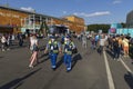 Two paramedics on duty in a street fan zone among the crowd at the Euro 2020