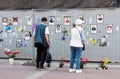 People look at the photos of died from covid-19 medical workers. St Petersburg. Russia