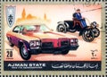 Saint Petersburg, Russia - March 06, 2020: Postage stamp issued in the Ajman with the image of old and antique Ford cars, circa