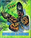 Saint Petersburg, Russia - March 15, 2020: Postage stamp issued in the Burundi with the image of the butterfly Drurya antimachus,