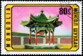 Saint Petersburg, Russia - March 06, 2020: Postage stamp issued in the Mongolia with the image of the Pavilion in the courtyard,