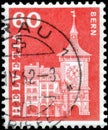 Saint Petersburg, Russia - May 05, 2020: Postage stamp issued in the Switzerland with the image of the Clock Tower in Berne. From