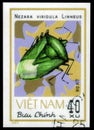 Saint Petersburg, Russia - May 31, 2020: Postage stamp issued in the Vietnam with the image of the Southern Green Stink Bug, Royalty Free Stock Photo