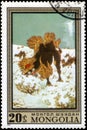 Saint Petersburg, Russia - May 17, 2020: Stamp issued in the Mongolia with image of Mythological animal in winter. From series on