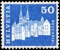 Saint Petersburg, Russia - May 05, 2020: Postage stamp issued in the Switzerland with the image of the Castle and Abbey Church,