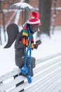 SAINT PETERSBURG, RUSSIA November 28, 2023, sculpture and city landmark - Angel reading a book on a bench in a winter park Royalty Free Stock Photo