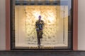 Show window of Louis Vuitton fashion store, decorated in Christmas style with bright Royalty Free Stock Photo
