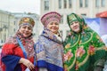 Saint Petersburg, Russia-November 4, 2019: three happy and smiling senior women dressed in Russian national costumes and headwear