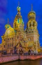 Ornate exterior of Church of Savior on Spilled Blood or Cathedral of Resurrection of Christ in Saint Petersburg, Russia at sunset