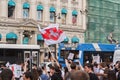 Saint Petersburg, Russia: people support democracy in Belarus waving with a white-red-white flag Royalty Free Stock Photo