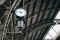 Architectural elements, vintage lantern and clock close-up.