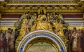 Ornate details of golden relief of Jesus Christ and saints in Saint Isaac`s Russian Orthodox Cathedral in Saint Petersburg, Russi