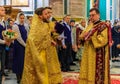 Russian Orthodox priest in traditional clothing serving in the Saint Isaac`s Russian Orthodox Cathedral in Saint Petersburg Russi