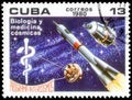 Saint Petersburg, Russia - September 18, 2020: Postage stamp issued in the Cuba the image of the Staff of Aesculapius, rocket and