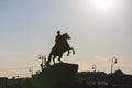 Silhouette of Bronze Horseman sculpture of Peter the Great on blue sky background