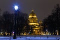 Saint Petersburg, Russia. St. Isaac`s Cathedral in lights of the evening city. View from the Palace Square in St. Petersburg. Royalty Free Stock Photo