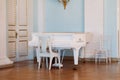 Saint Petersburg, Russia, 18.04.2019, Yusupov Palace dance hall. Baroque white piano C. Bechstein