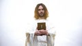 Saint Prophet holding Bible, revelation teachings for Christians, Commandments