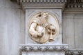 Saint, relief on the portal of the Cathedral of Saint Lawrence in Lugano