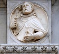 Saint, relief on the portal of the Cathedral of Saint Lawrence in Lugano
