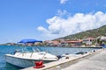 Saint Thomas, US Virgin Islands - April 01 2014: Sailboat and speedboats docked in Saint Thomas Royalty Free Stock Photo