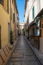 Saint Trope narrow street with plants Royalty Free Stock Photo
