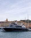 Saint Tropez with famous Notre Dame de l'Assomption church, yachts  on Cote d'Azur, French Riviera Royalty Free Stock Photo