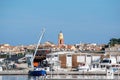 Saint Tropez view from far away with palm trees water and blue sky