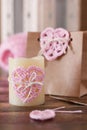 Saint Valentine decoration: handmade crochet pink heart for candle and gift paper package