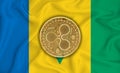 Saint Vincent and the Grenadines flag, ripple gold coin on flag background. The concept of blockchain, bitcoin, currency