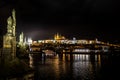 Illuminated Saint Vitus Cathedral, Hradcany Castle And River Moldova In The Night In Prague In The Czech Republic Royalty Free Stock Photo