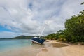 Sainte-Anne, Martinique, FWI - Abandoned beached sailboat in Pointe Marin beach